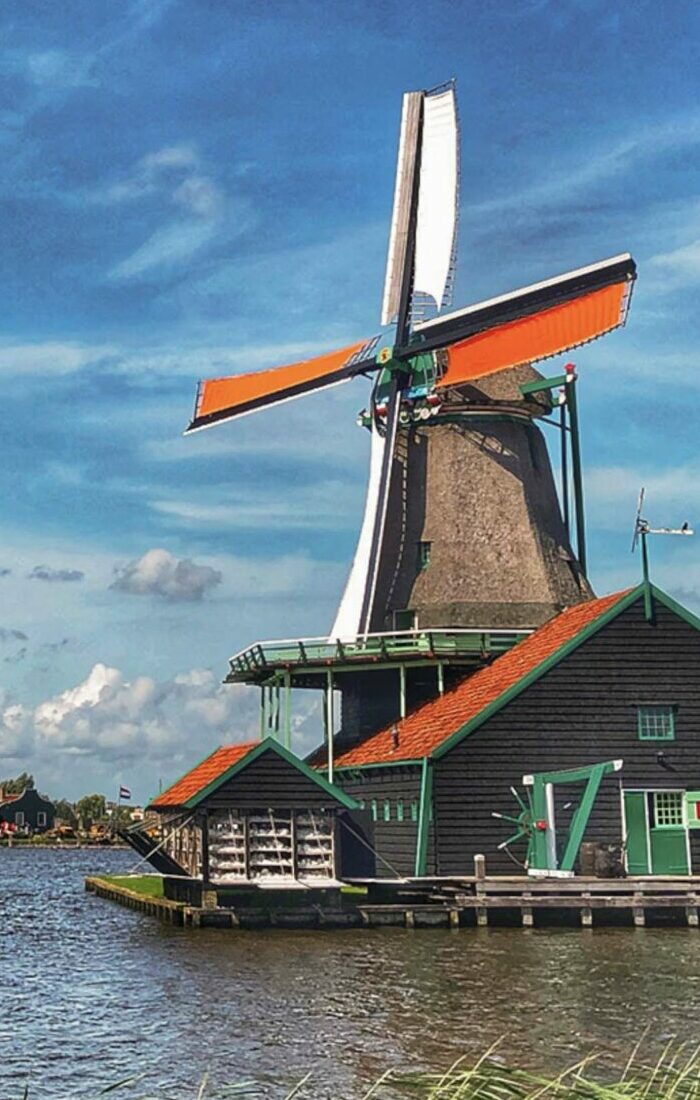riverbank-windmills-clouds-zaanse-schans_North_Holland_Netherlands_Destination_3840x1920_2025